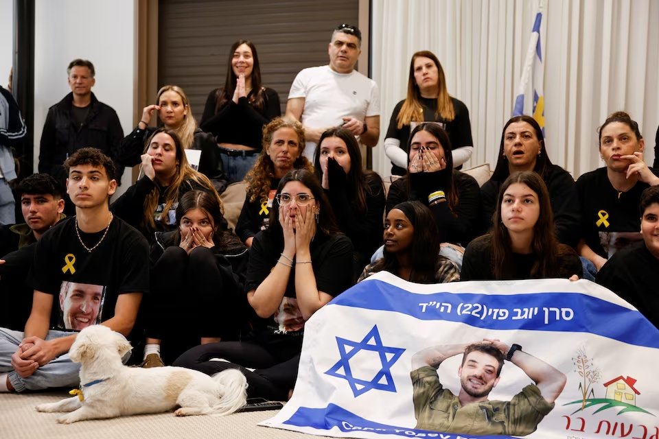 Friends and supporters react to the release of Sagui Dekel-Chen, who was taken from Kibbutz Nir Oz and held in Gaza since the deadly October 7, 2023 attack, as part of a ceasefire deal in Gaza between Hamas and Israel