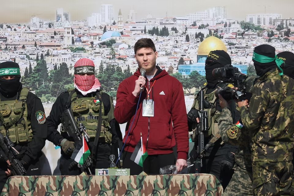 Russian-Israeli Sasha (Alexander) Troufanov, a hostage held in Gaza since the deadly October 7, 2023 attack, speaks as he is released by Palestinian Hamas and Islamic Jihad militants as part of a ceasefire and a hostages-prisoners swap deal between Hamas and Israel 