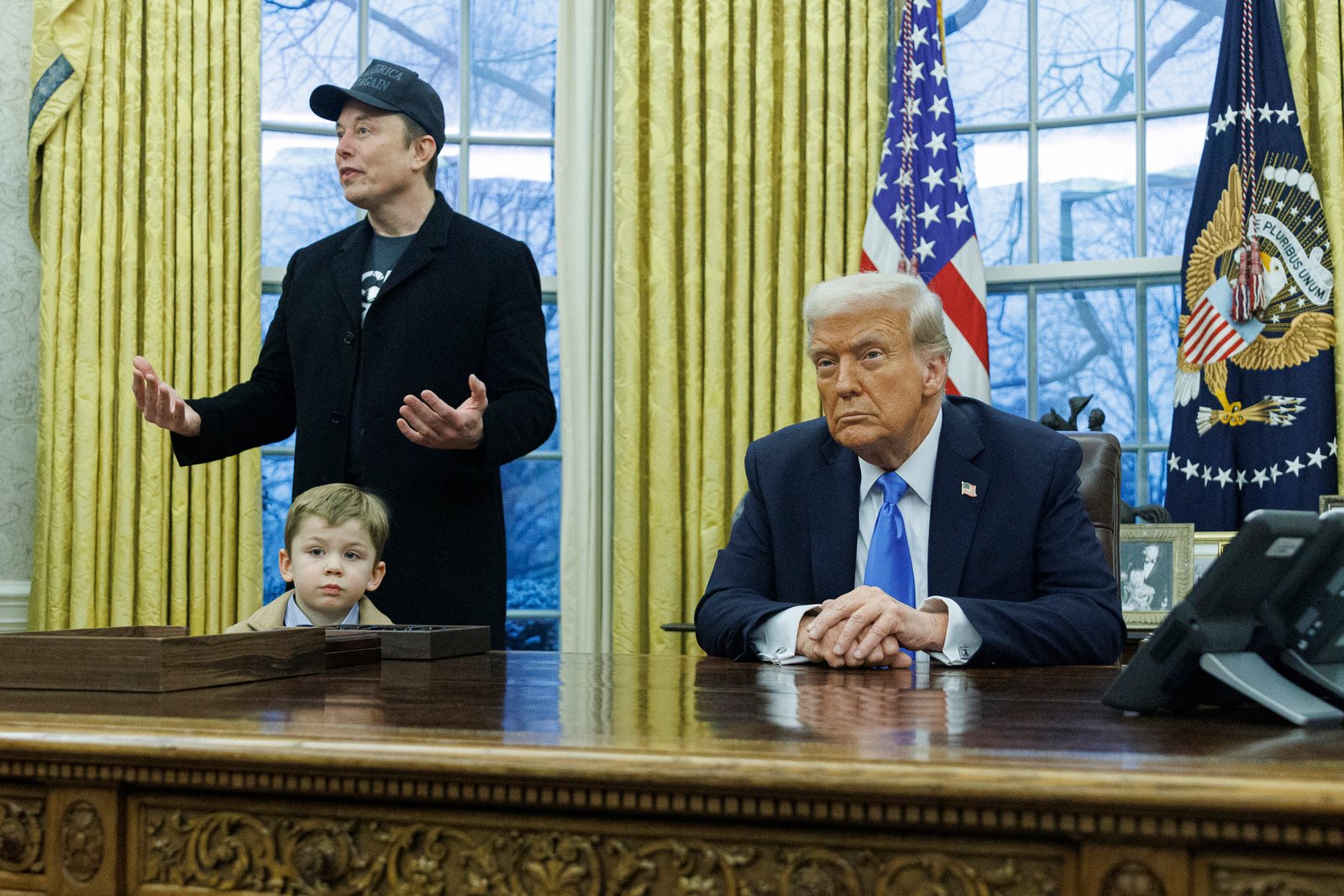 Elon Musk speaks next to U.S. President Donald Trump in the Oval Office of the White House in Washington, D.C., U.S., February 11, 2025.