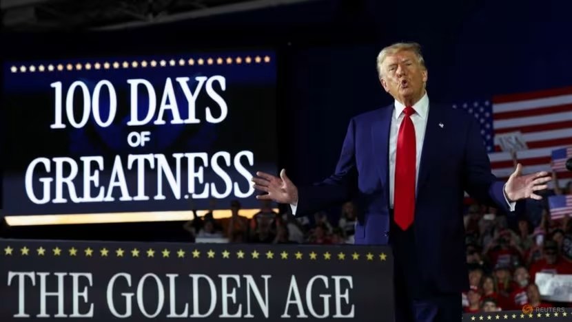 Trump touts economy at Michigan 100-day rally, as Americans grow wary