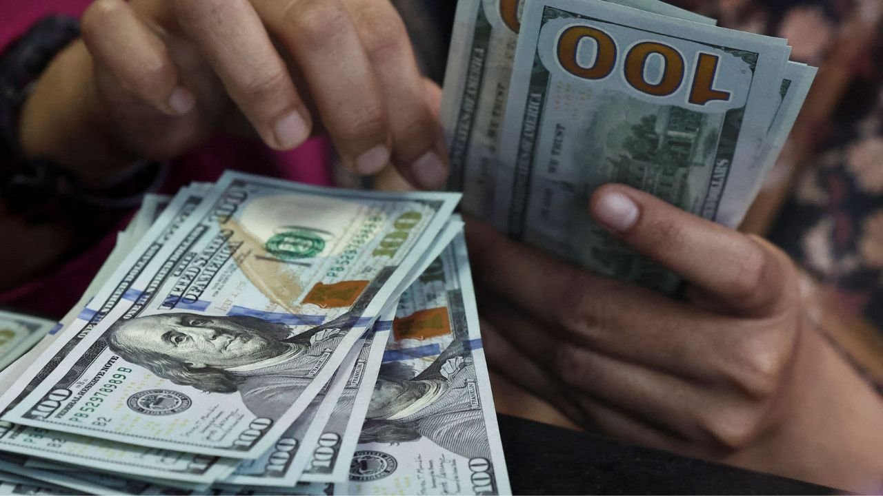 Dollar drops with US yields after data, set for fourth weekly rise vs euro