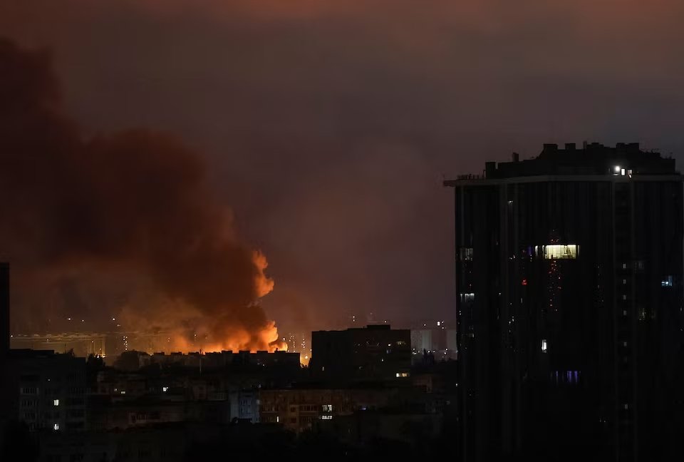 Russian strikes pound Kyiv, killing 6-year-old boy and leaving dozens injured