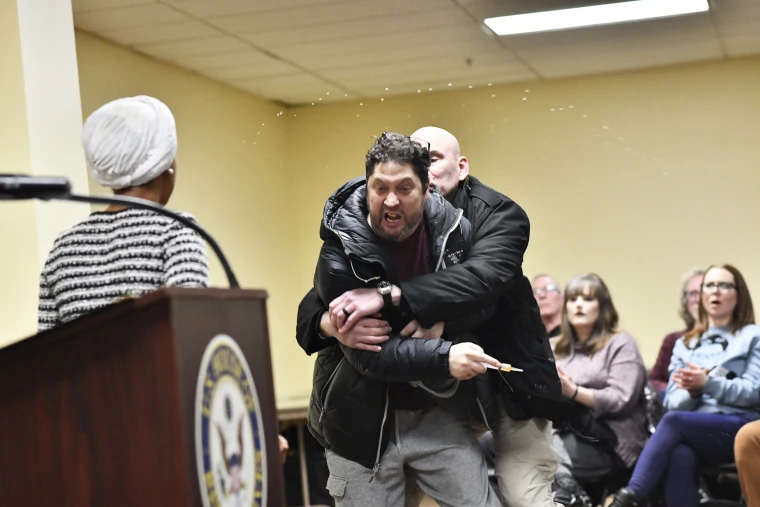 Man Arrested After Attempting to Spray Rep. Ilhan Omar During Minneapolis Town Hall