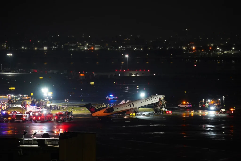 2 pilots killed after Air Canada plane collides with fire-rescue truck at LaGuardia Airport, officials say