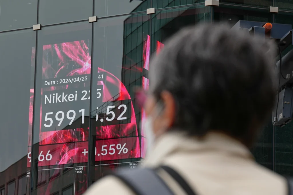 Asian stocks retreat and oil tops $100 despite fresh records on Wall St